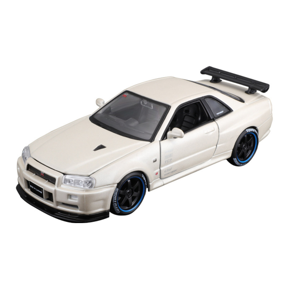 Bburago 1/24 Nissan GT-R R34 – JDM Efsanesi ve Metalik Performans Ruhu Diecast Koleksiyonunuzda